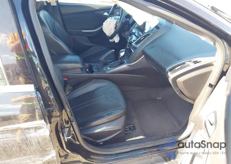 2014 Ford Focus Titanium из США, поврежденный, VIN 1FADP3J2XEL212933